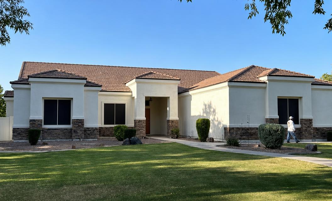 A & J Painting exterior project showing a freshly painted stucco home